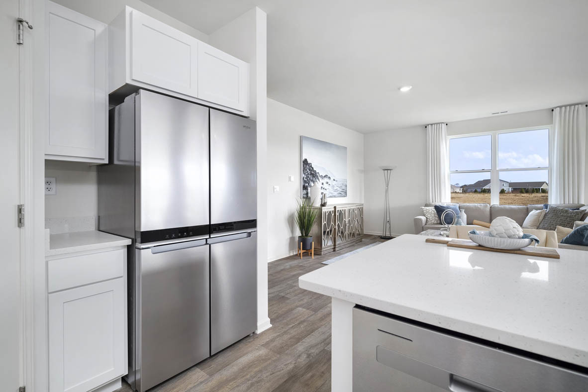 799 Mesa Lane Pingree Grove, IL 60140 - Photo 31 of 54 a kitchen with stainless steel appliances a refrigerator sink and stove
