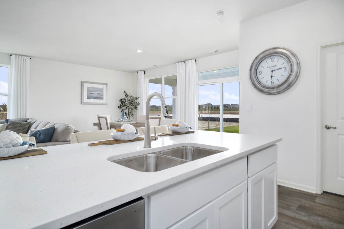 799 Mesa Lane Pingree Grove, IL 60140 - Photo 32 of 54 a view of a kitchen with a sink and a stove top oven
