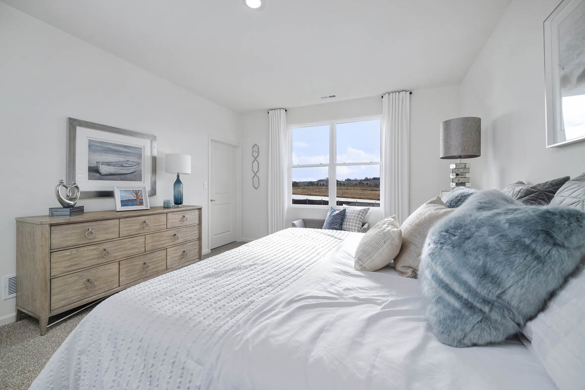 799 Mesa Lane Pingree Grove, IL 60140 - Photo 36 of 54 a bedroom with a bed and a dresser