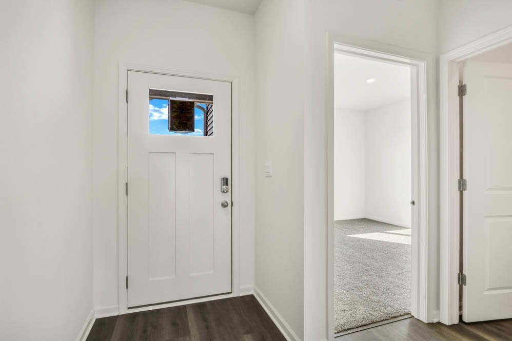 799 Mesa Lane Pingree Grove, IL 60140 - Photo 4 of 54 a view of a hallway with wooden floor