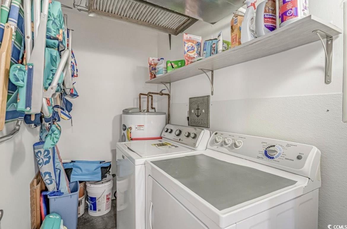 601 Mitchell Drive, Unit 1103 Myrtle Beach, SC 29577 - Photo 16 of 25 Laundry room featuring washing machine and dryer and electric water heater