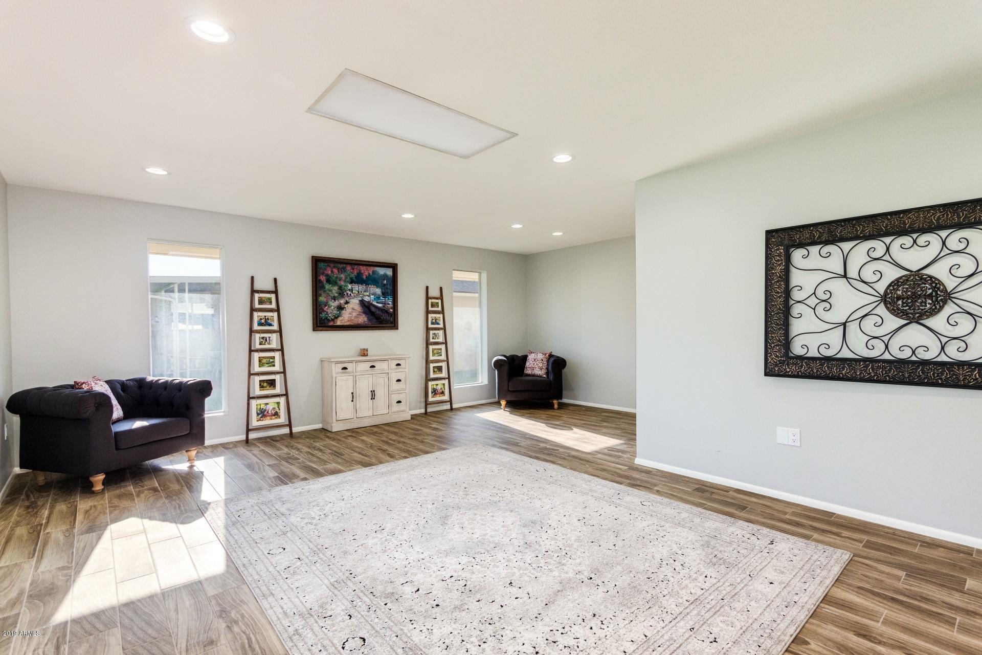 10805 West Hatcher Road Sun City, AZ 85351 - Photo 11 of 46 Open living/dining area