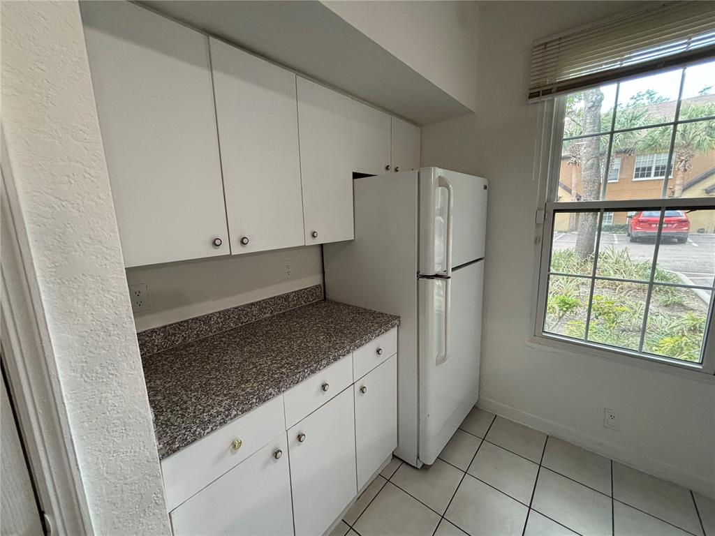 6340 Raleigh Street, Unit 1001 Orlando, FL 32835 - Photo 4 of 27