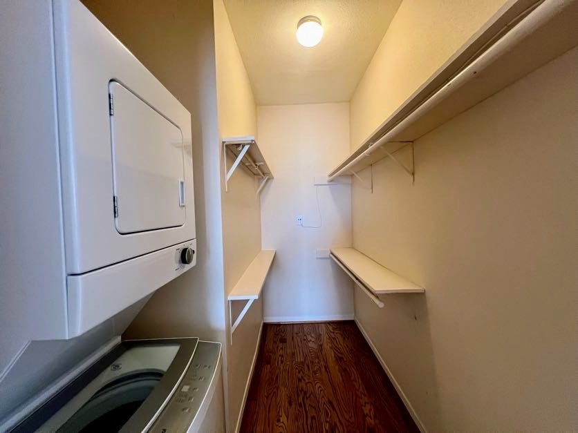 4041 Drake Street, Unit 118 Houston, TX 77005 - Photo 17 of 22 a view of a hallway with wooden floor and staircase