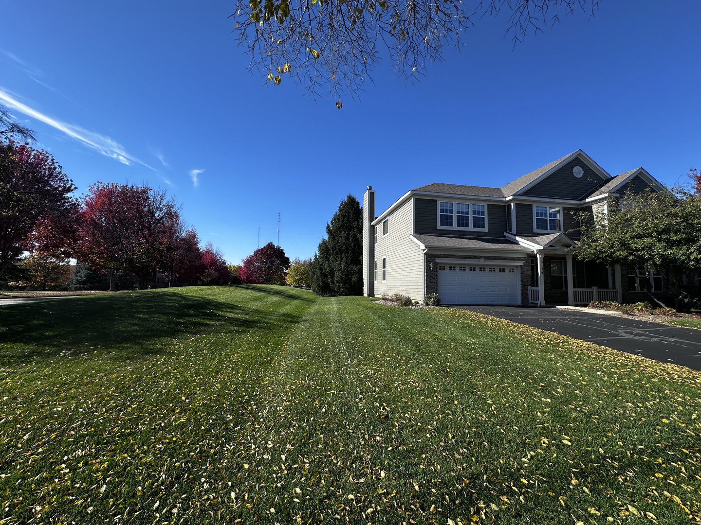 3134 Kyra Lane Elgin, IL 60124 - Photo 2 of 56 a front view of a house with garden