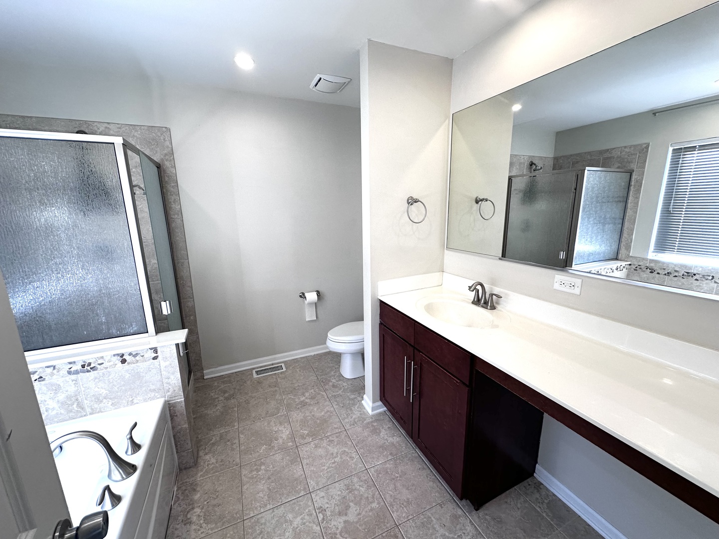 3134 Kyra Lane Elgin, IL 60124 - Photo 27 of 56 a bathroom with a double vanity sink toilet and mirror