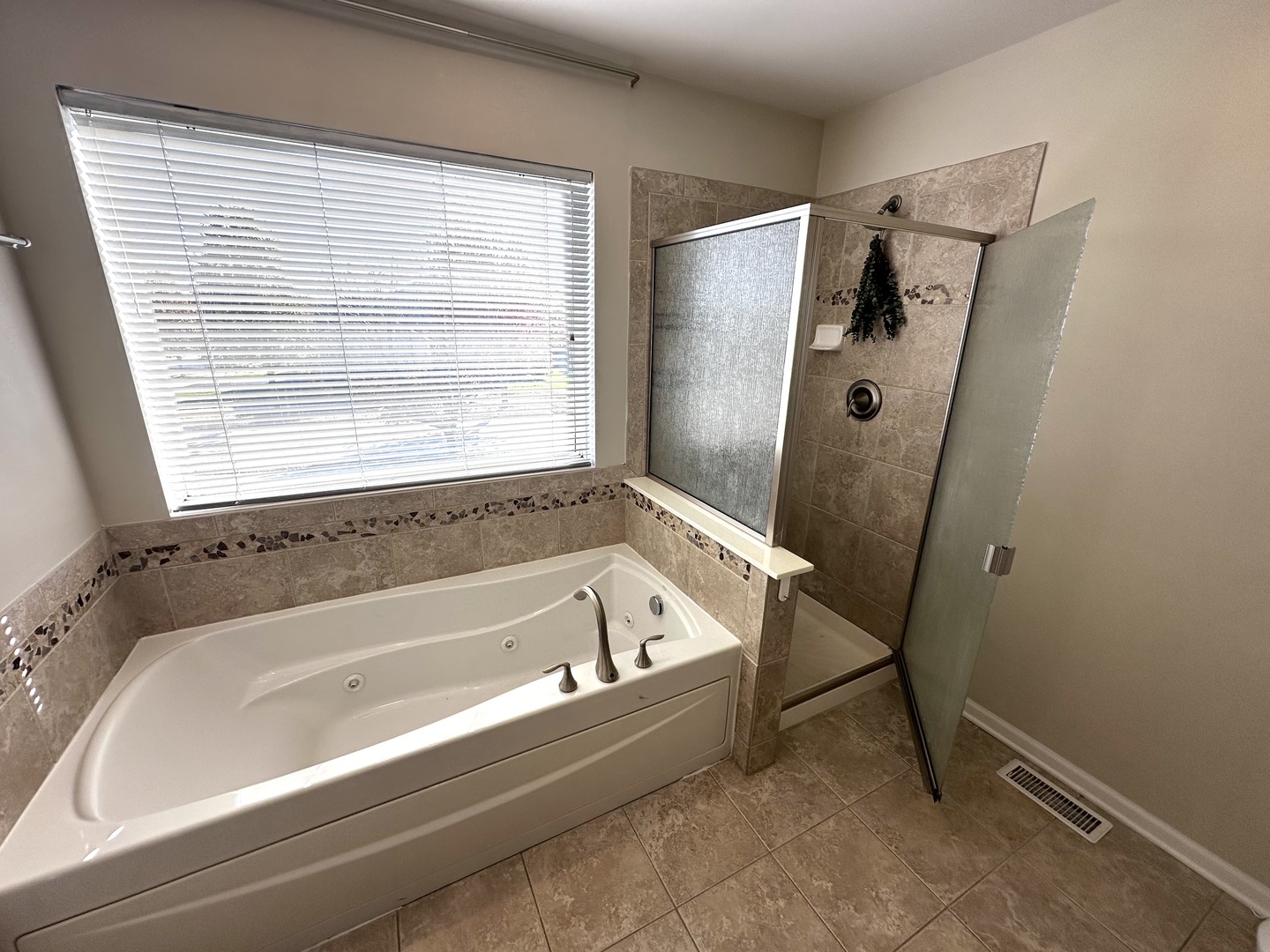 3134 Kyra Lane Elgin, IL 60124 - Photo 28 of 56 a bathroom with a tub and a shower