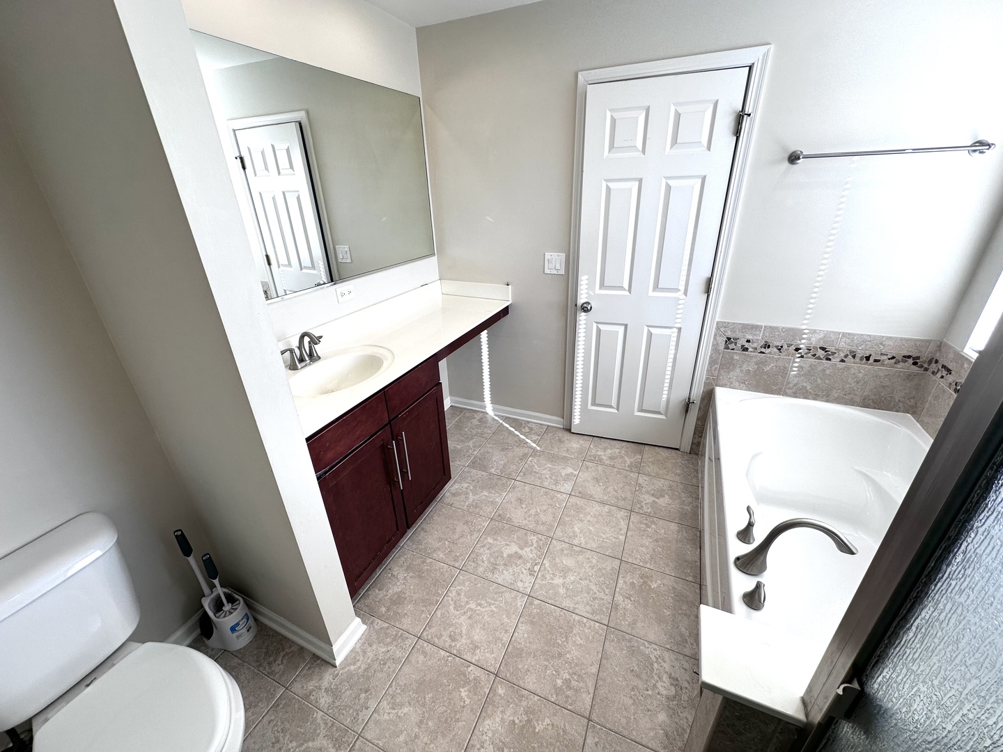 3134 Kyra Lane Elgin, IL 60124 - Photo 29 of 56 a bathroom with a toilet sink and mirror