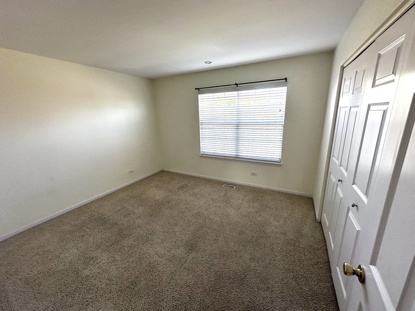 3134 Kyra Lane Elgin, IL 60124 - Photo 32 of 56 a view of an empty room with a window