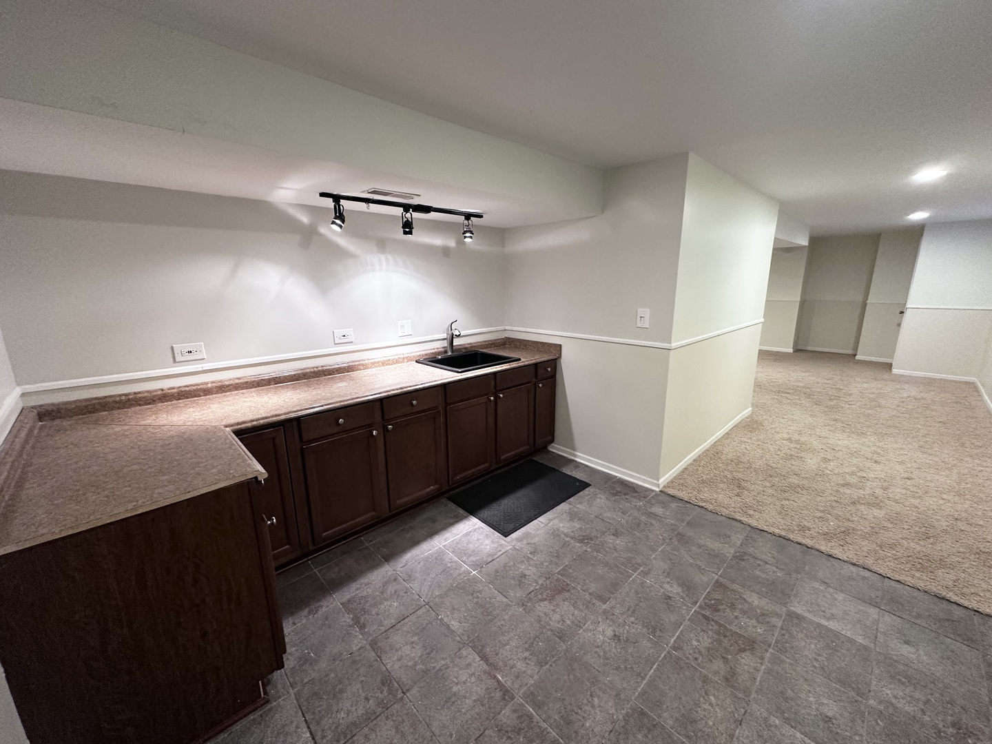 3134 Kyra Lane Elgin, IL 60124 - Photo 48 of 56 a kitchen with stainless steel appliances granite countertop a sink stove and refrigerator