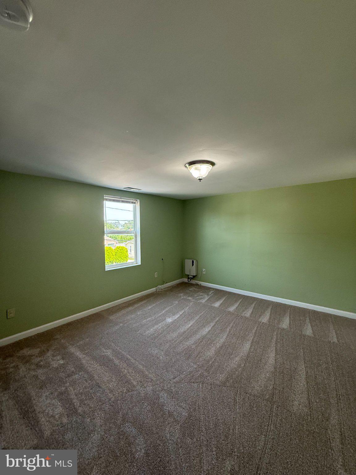 123 Winters Lane Baltimore, MD 21228 - Photo 13 of 28 Bright and airy green space awaits.
