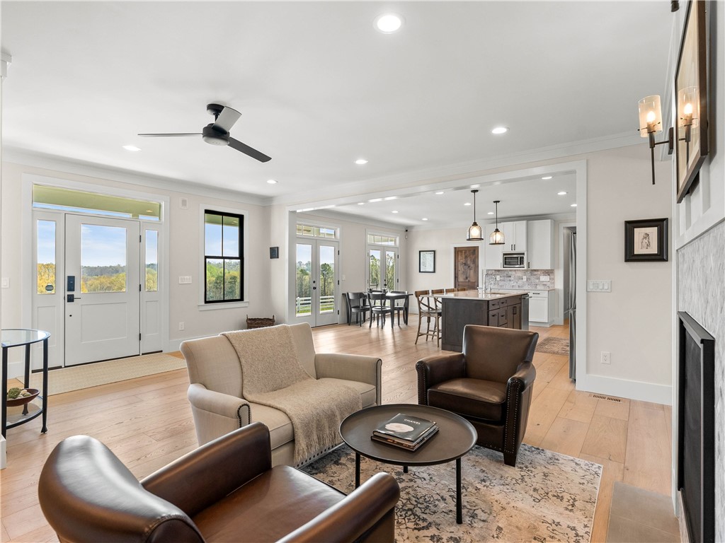 331 Bakerville Road Easley, SC 29642 - Photo 9 of 43 Bright and open concept living area seamlessly connecting to the kitchen and dining spaces.