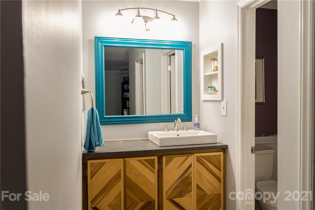 12232 Danby Road Pineville, NC 28134 - Photo 12 of 15 a bathroom with a sink and a mirror