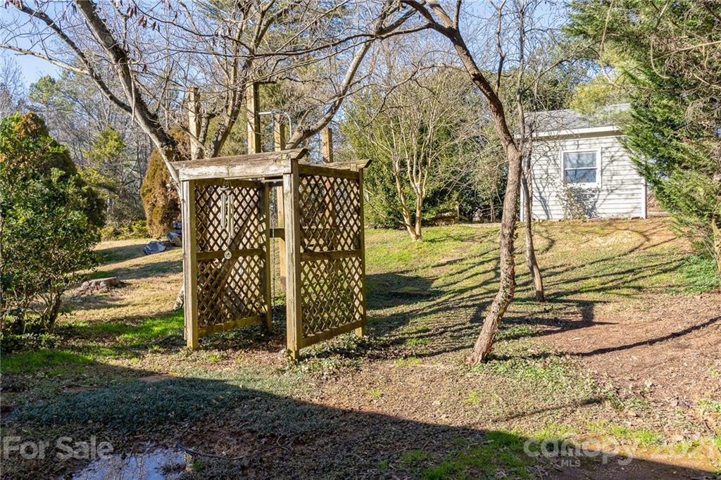 12232 Danby Road Pineville, NC 28134 - Photo 13 of 15 a view of a entrance gate of the house