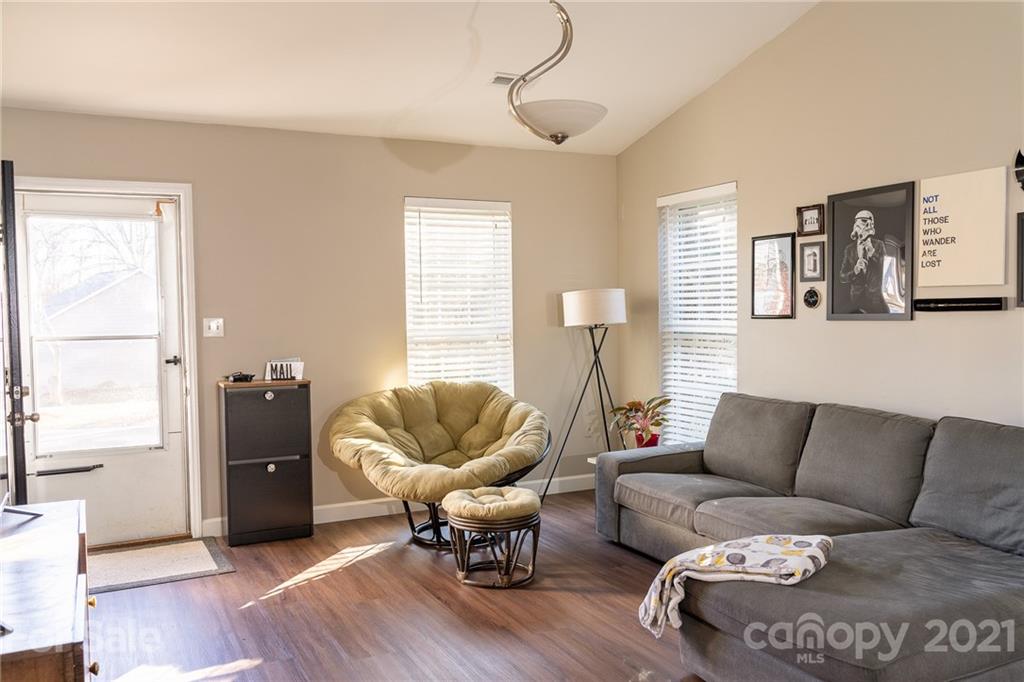 12232 Danby Road Pineville, NC 28134 - Photo 5 of 15 a living room with furniture and a large window
