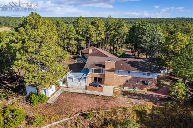 15035 Raton Road Colorado Springs, CO 80921 - Photo 2 of 2 Aerial view of the back of the house