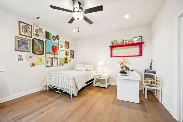a bathroom with a double vanity sink mirror and shower