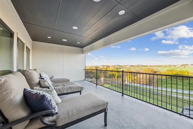 an aerial view of a house with a ocean view