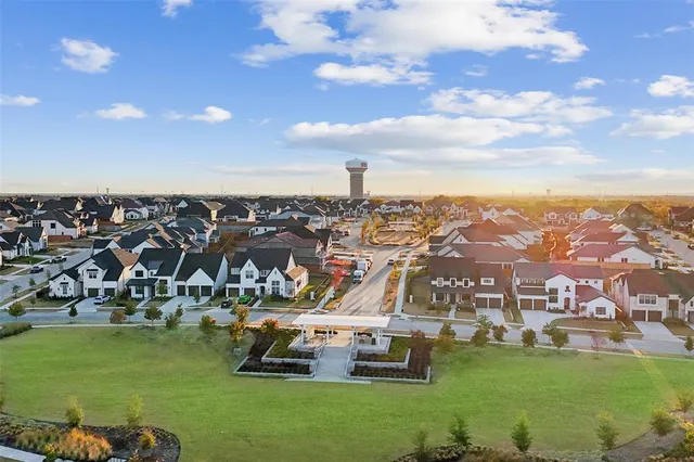 an aerial view of a house with a ocean view