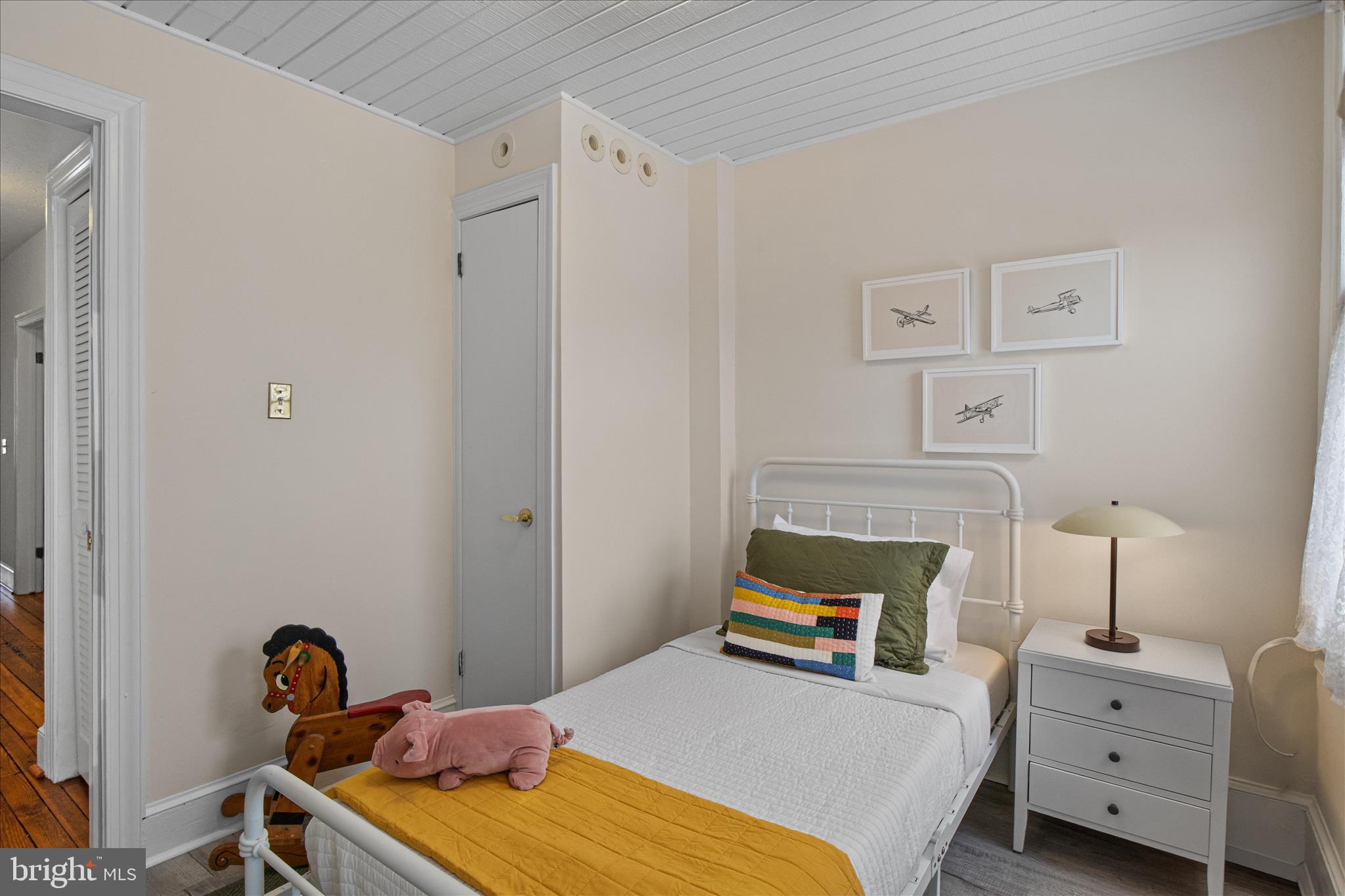 140 11th Street Northeast Washington, DC 20002 - Photo 30 of 45 a bedroom with a bed and a dresser