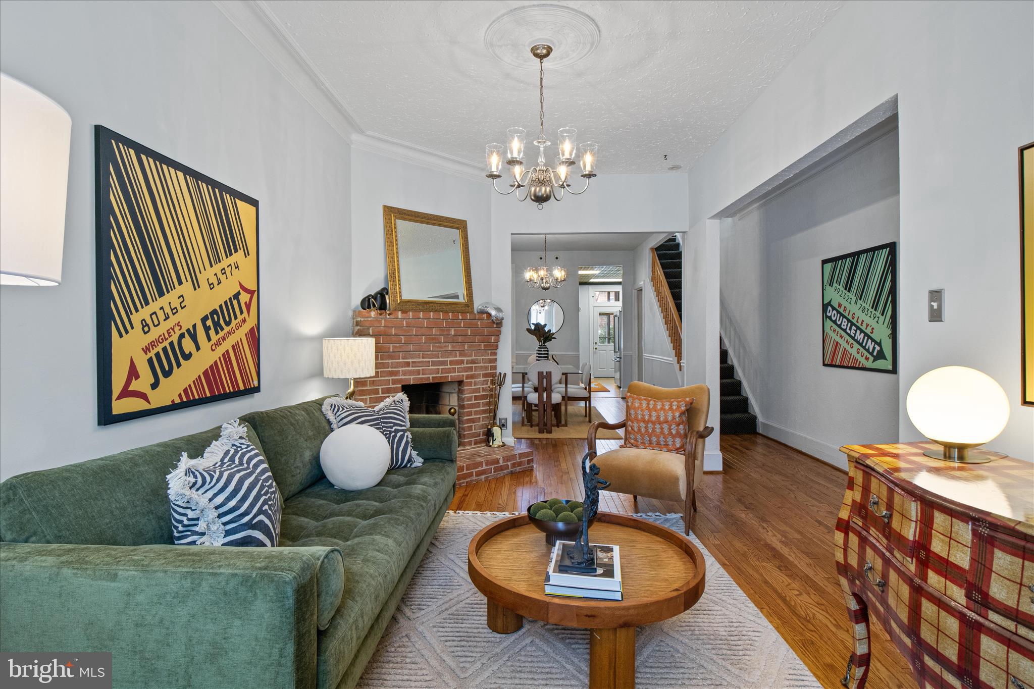 140 11th Street Northeast Washington, DC 20002 - Photo 6 of 45 a living room with furniture and a chandelier
