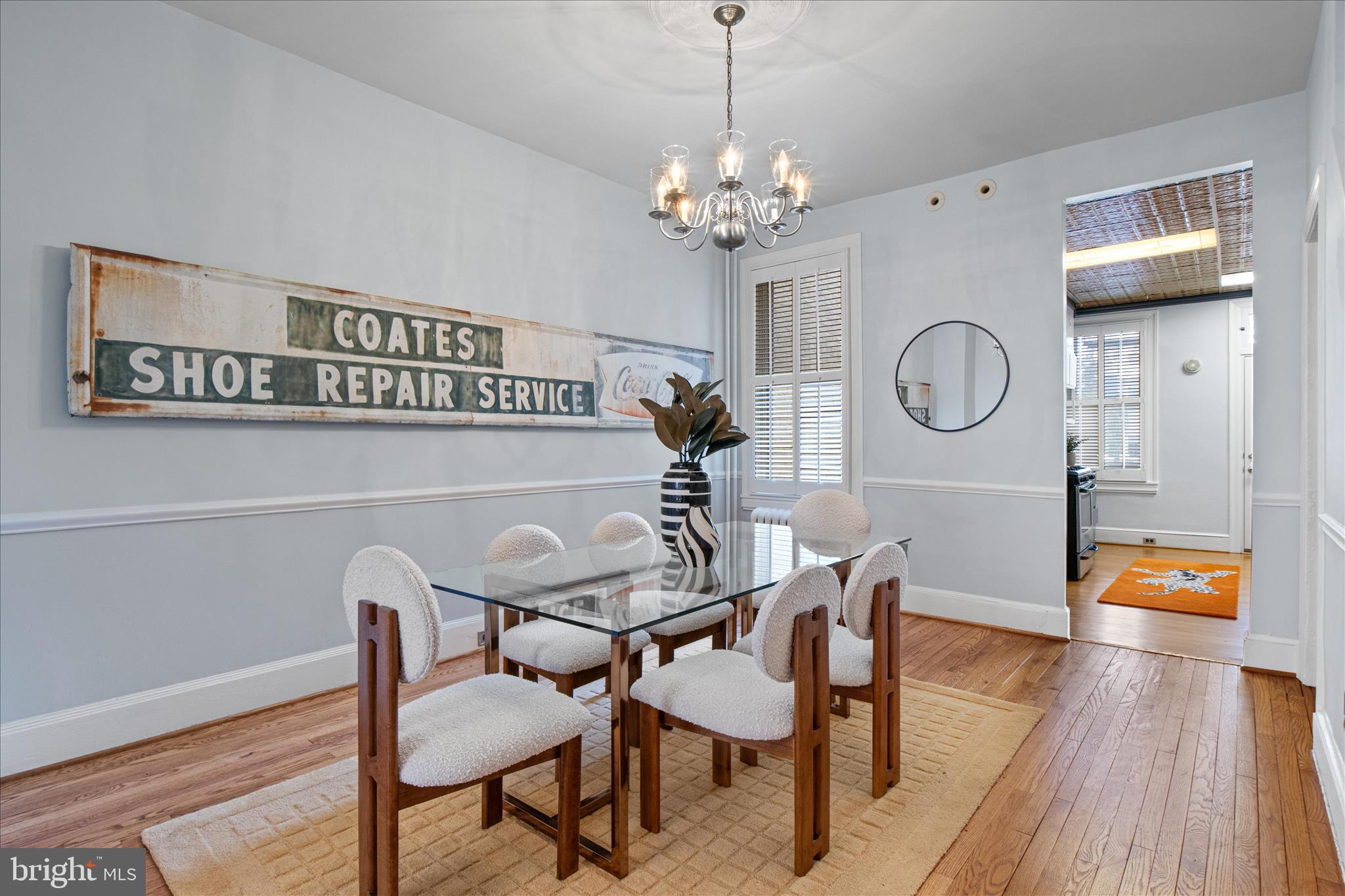 140 11th Street Northeast Washington, DC 20002 - Photo 9 of 45 a view of a dining room with furniture a chandelier and wooden floor