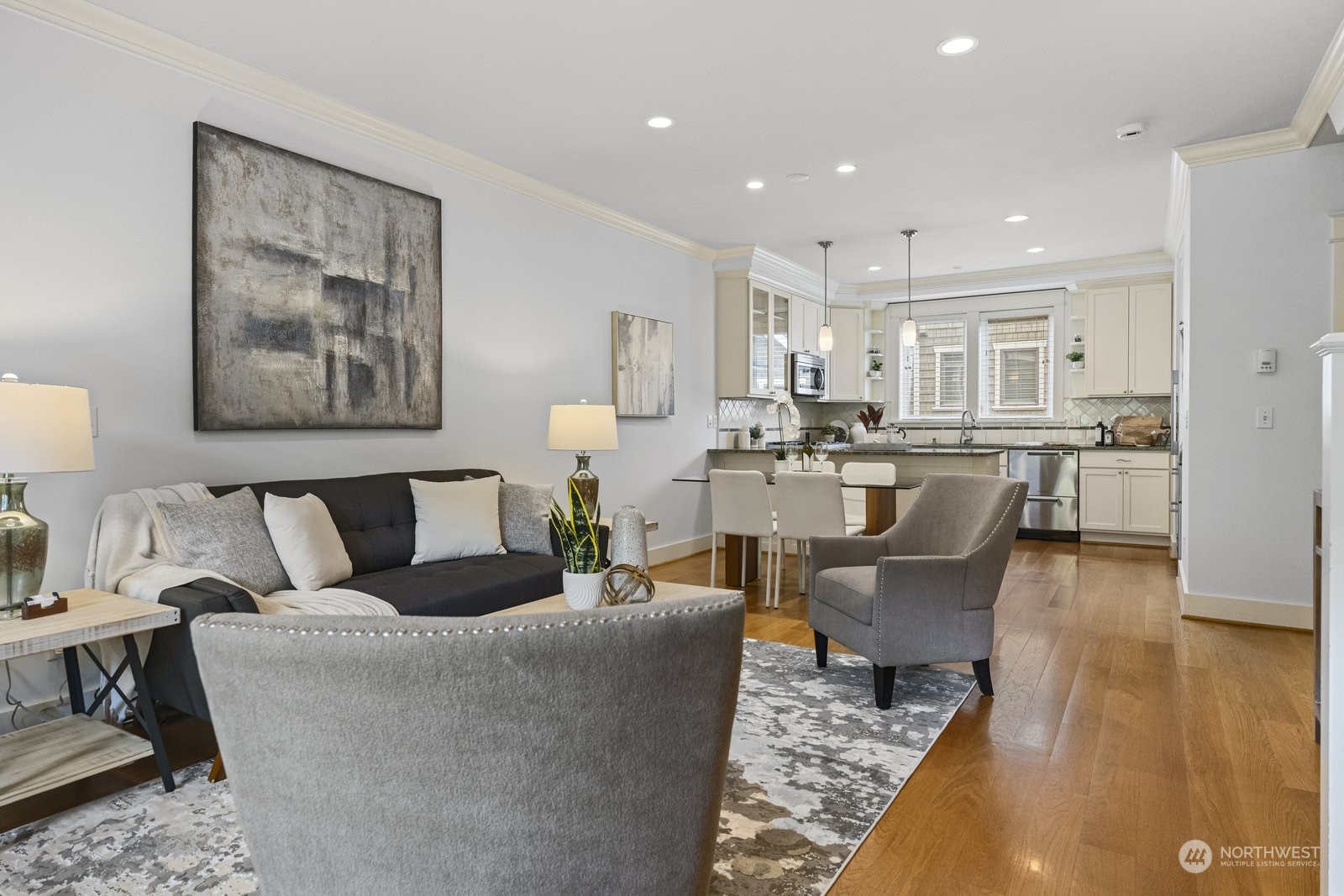 16 West Etruria Street Seattle, WA 98119 - Photo 2 of 40 a living room with furniture and kitchen view