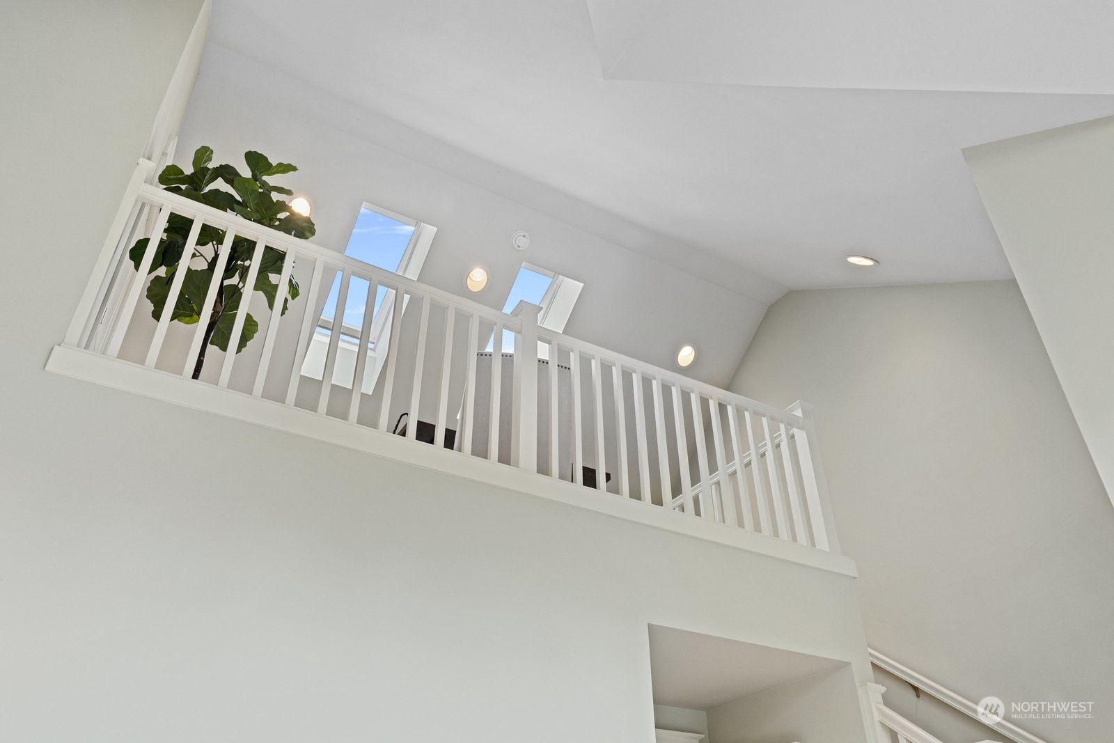 16 West Etruria Street Seattle, WA 98119 - Photo 21 of 40 a view of staircase with white walls