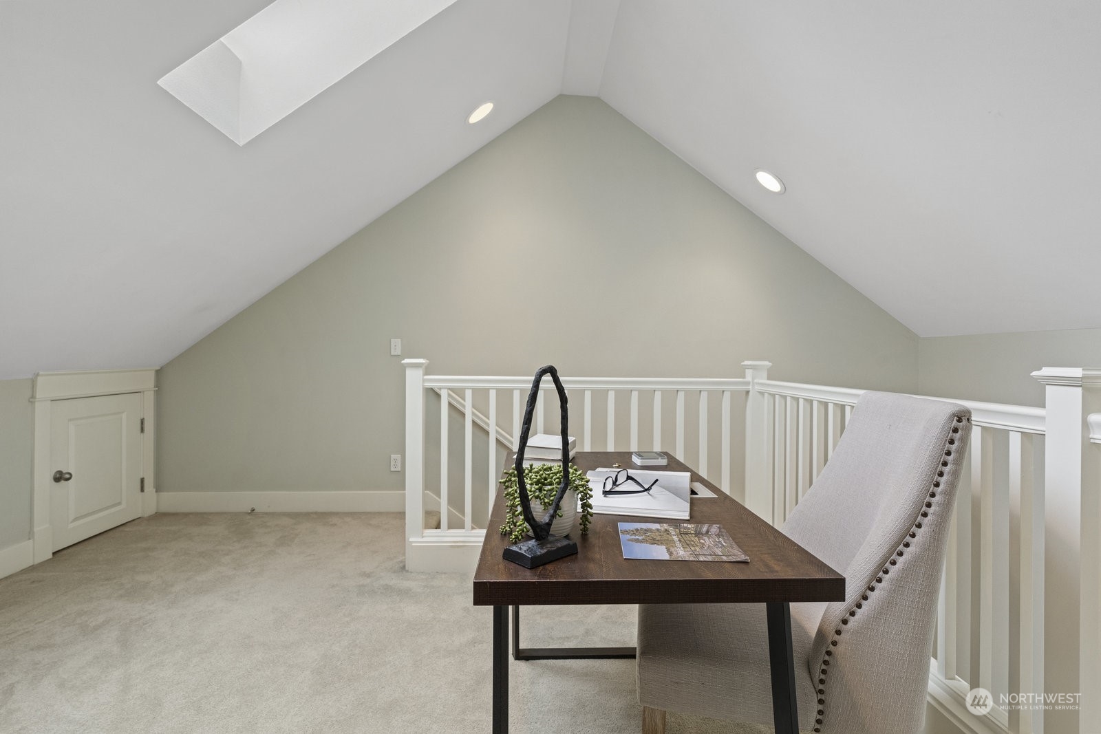 16 West Etruria Street Seattle, WA 98119 - Photo 23 of 40 a view of a workspace with furniture
