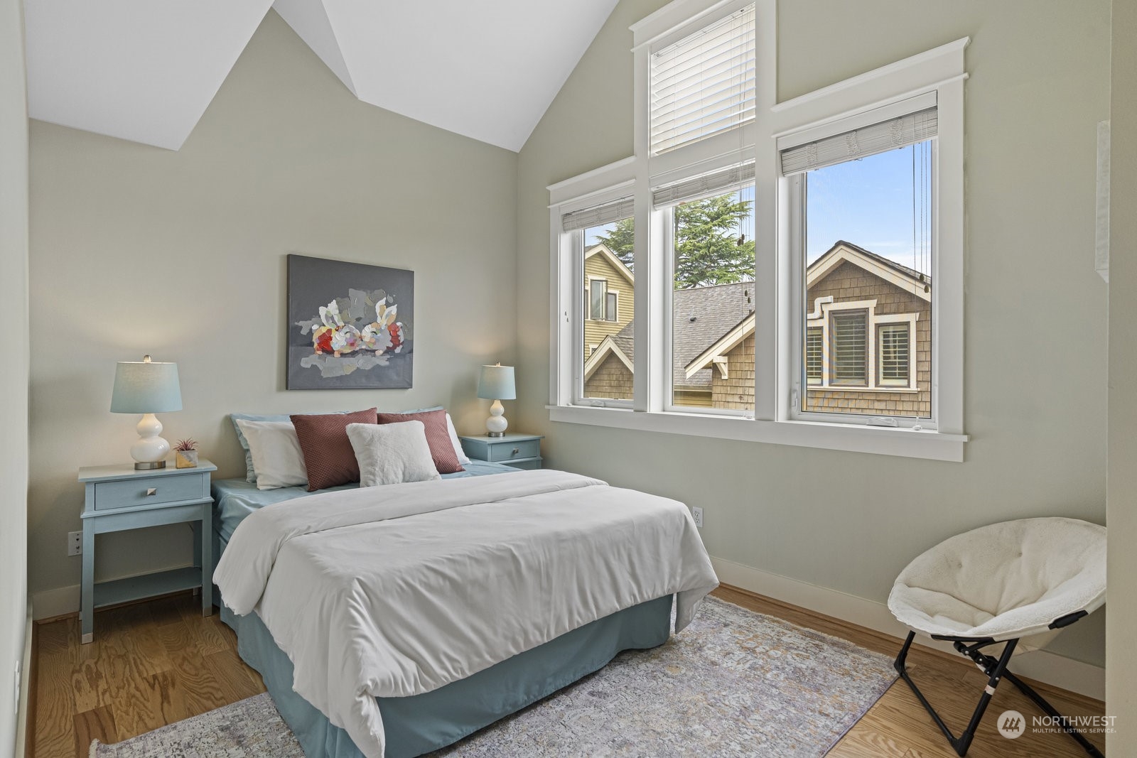 16 West Etruria Street Seattle, WA 98119 - Photo 24 of 40 a bedroom with a bed and a window
