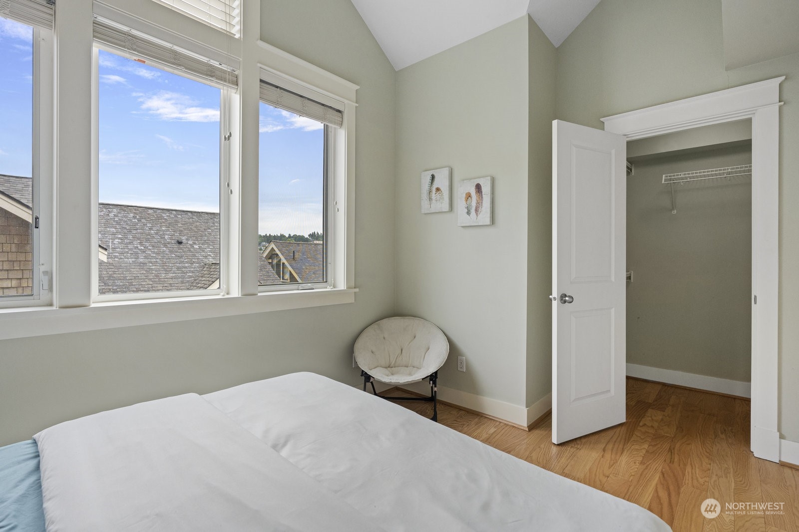 16 West Etruria Street Seattle, WA 98119 - Photo 25 of 40 a bedroom with a bed and window