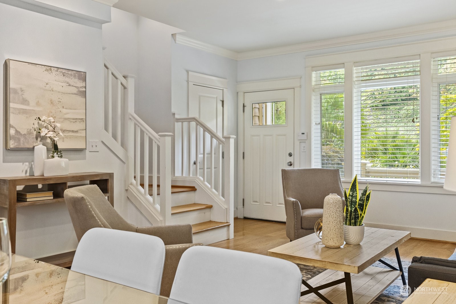 16 West Etruria Street Seattle, WA 98119 - Photo 5 of 40 a view of a livingroom with furniture and a potted plant