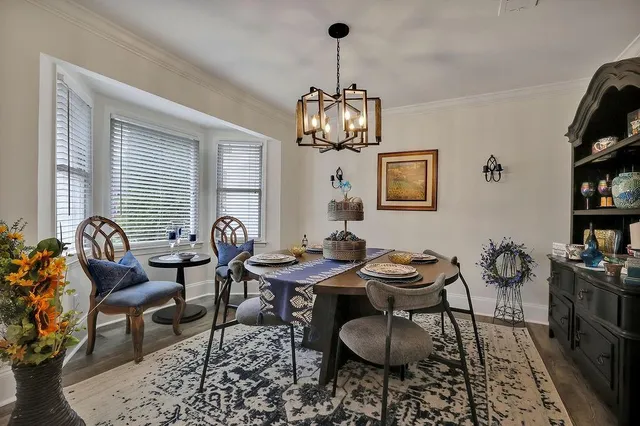 a view of a dining room with furniture