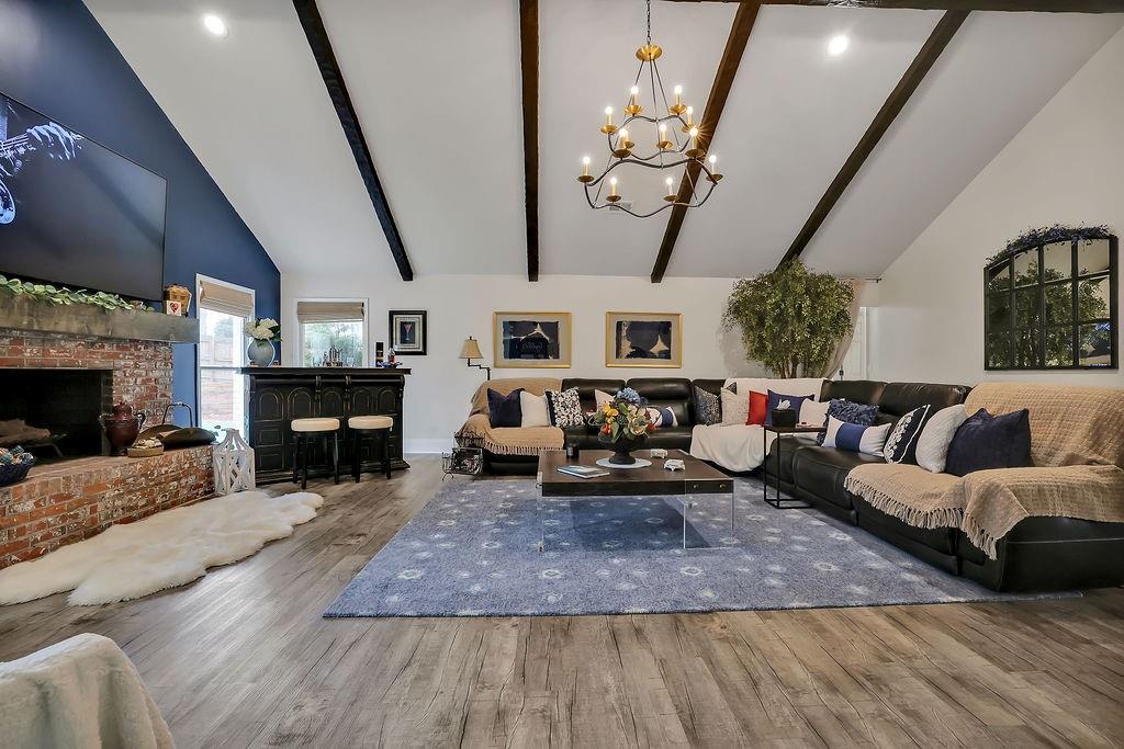 5455 Shiver Summit Northeast Atlanta, GA 30342 - Photo 4 of 14 a living room with furniture and a fireplace