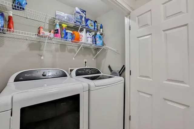 a utility room with dryer and washer