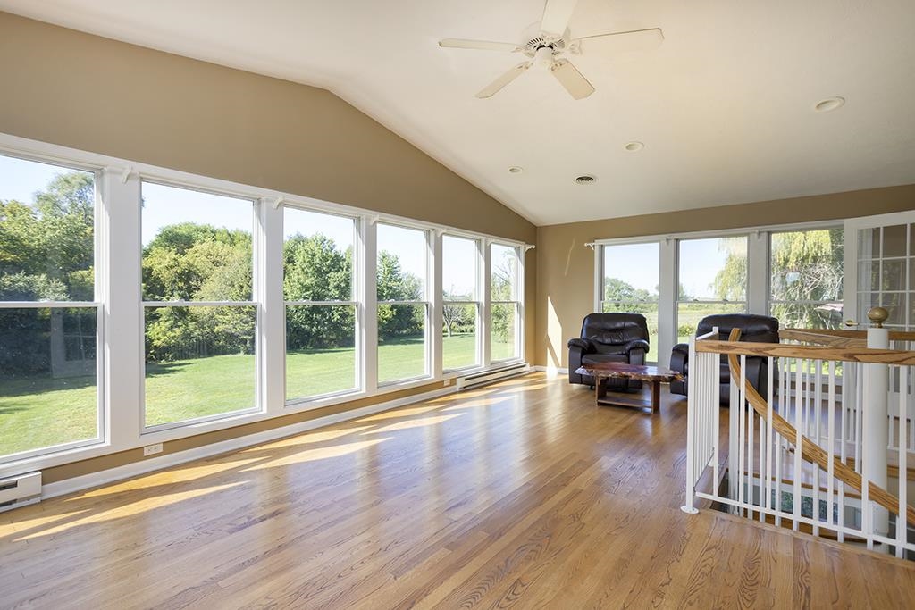 7257 Reeds Crossing Road Belvidere, IL 61008 - Photo 3 of 35 a view of livingroom with furniture and floor to ceiling window