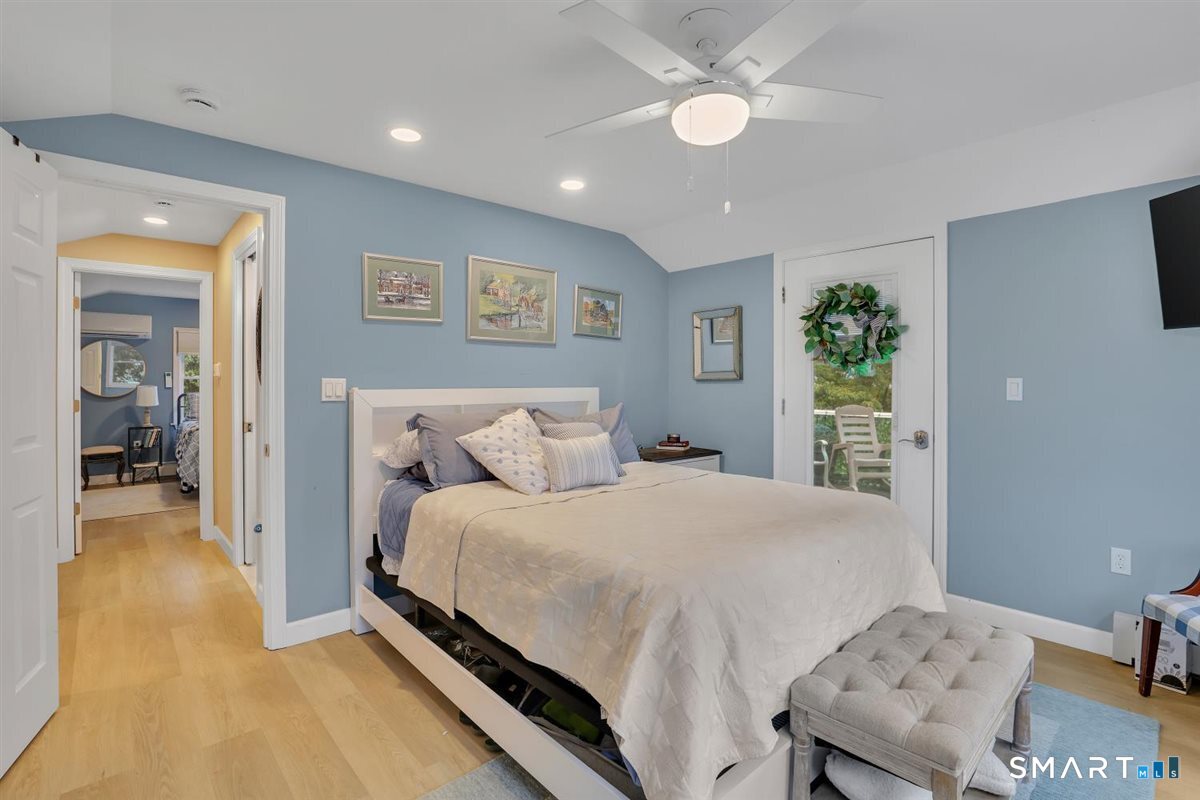 16 Hawthorne Road East Hampton, CT 06424 - Photo 14 of 40 Master bedroom offers views of the lake, plenty of closet space and it's own deck for sunning.