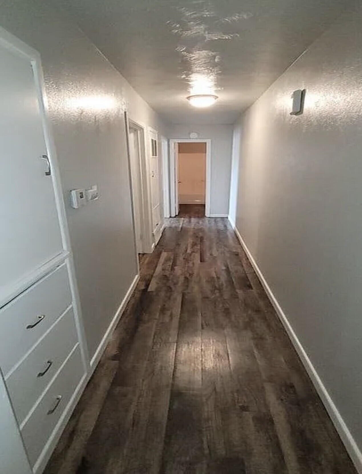 4427 31st Street, Unit A Lubbock, TX 79410 - Photo 4 of 9 a view of a hallway