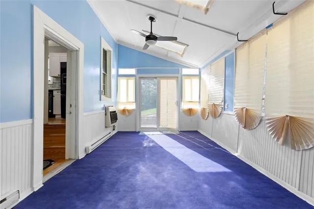 a view of an empty room and window