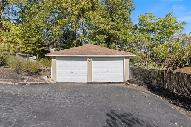 a front view of a house with a garage