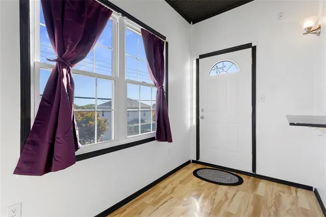 a view of an entryway with a floor