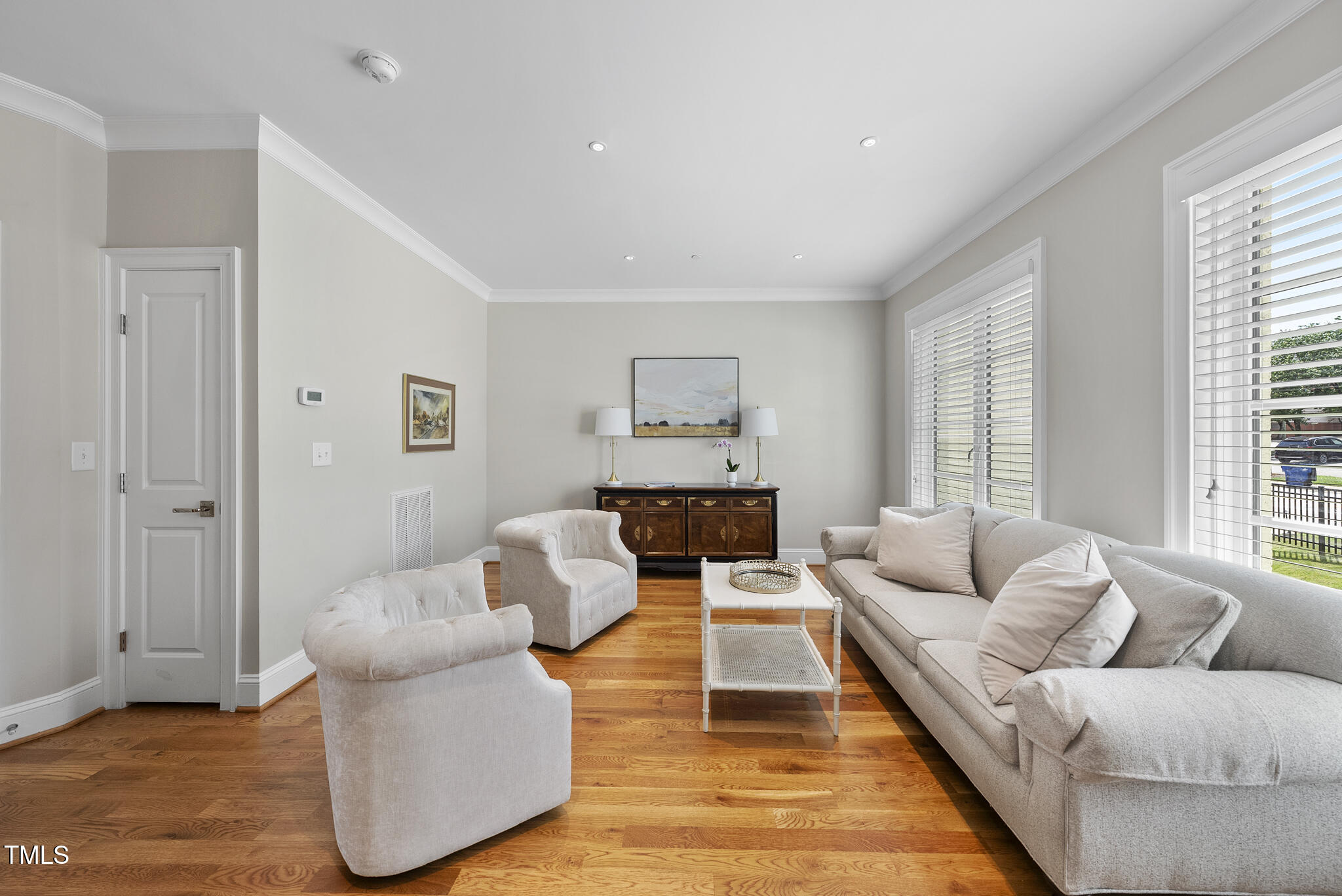 606 Daniels Street, Unit B Raleigh, NC 27605 - Photo 11 of 27 a living room with furniture and a couch
