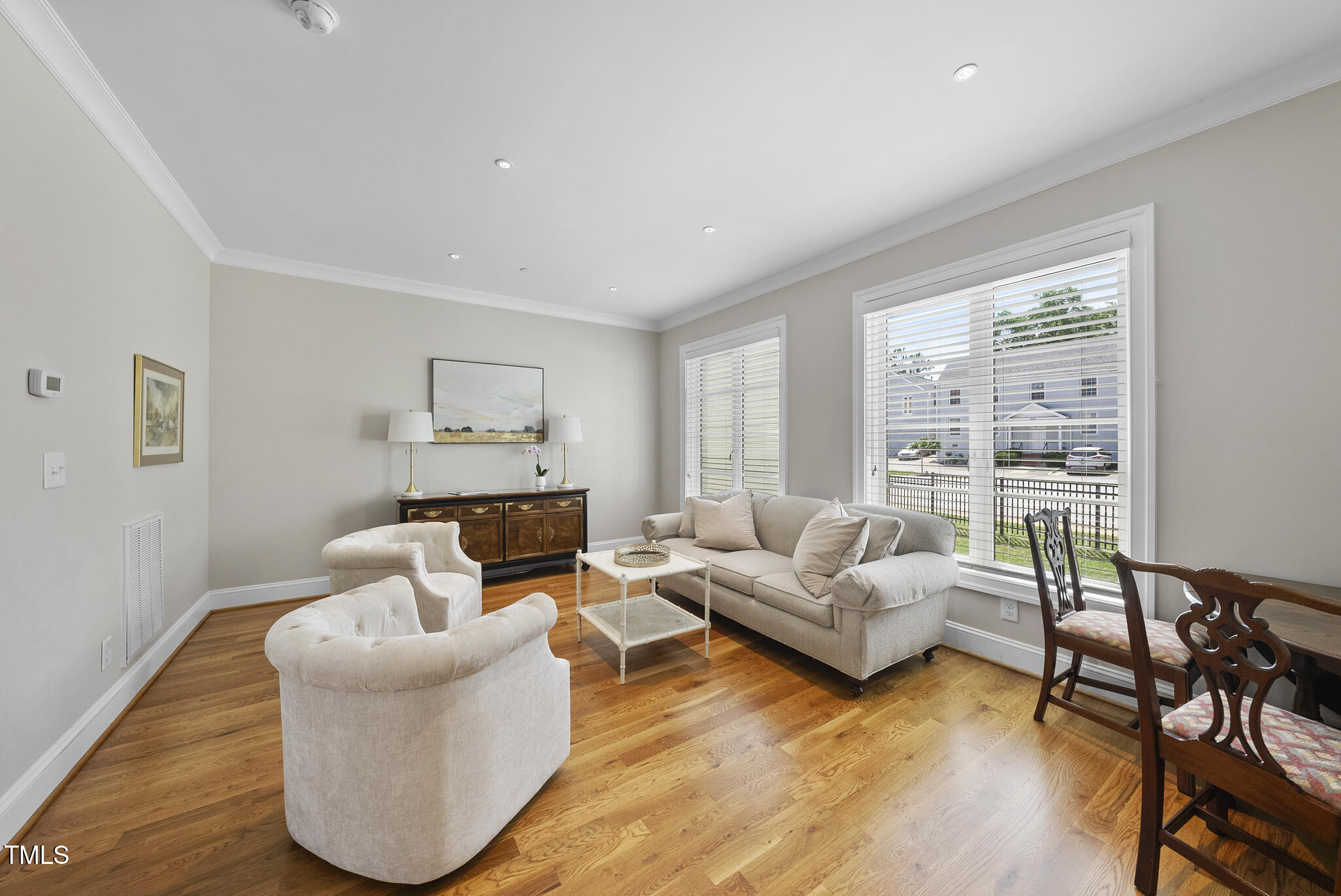 606 Daniels Street, Unit B Raleigh, NC 27605 - Photo 13 of 27 a living room with furniture and a large window