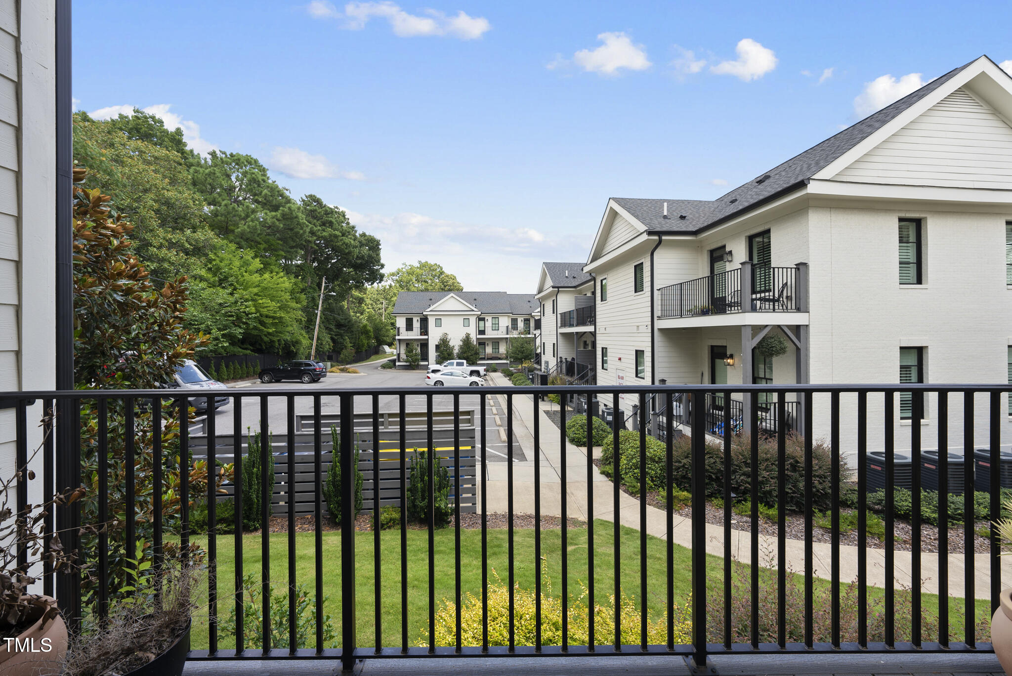 606 Daniels Street, Unit B Raleigh, NC 27605 - Photo 20 of 27 a view of a street from a balcony
