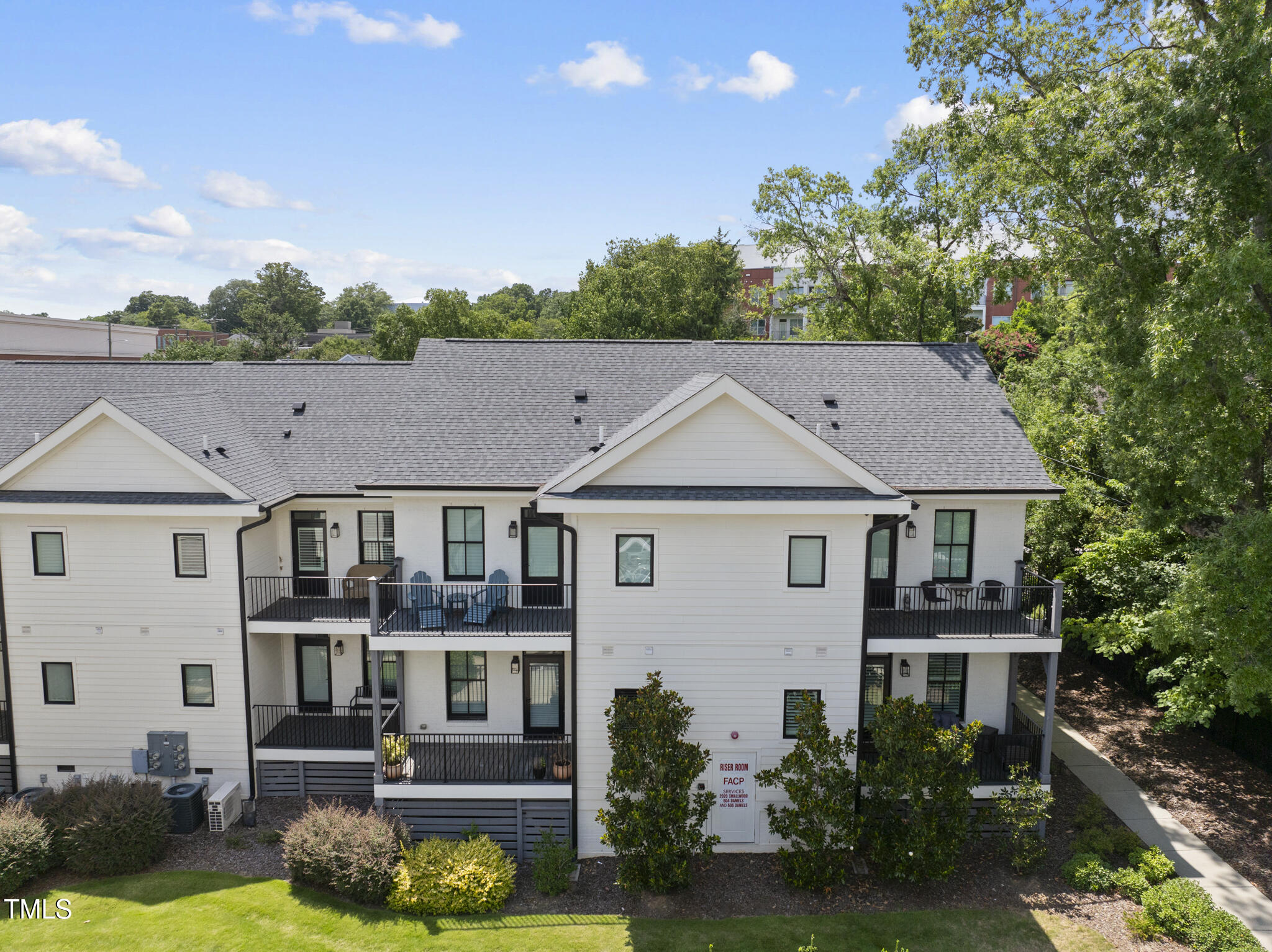 606 Daniels Street, Unit B Raleigh, NC 27605 - Photo 22 of 27 an aerial view of a house with yard