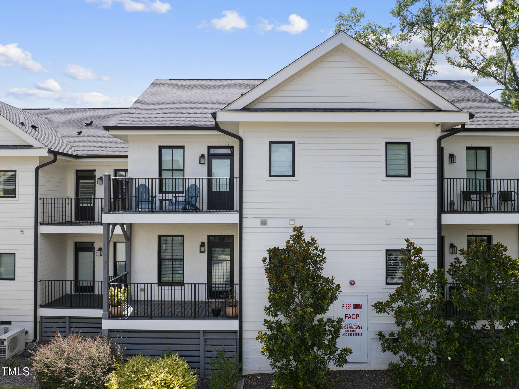 606 Daniels Street, Unit B Raleigh, NC 27605 - Photo 23 of 27 a front view of a house with garden