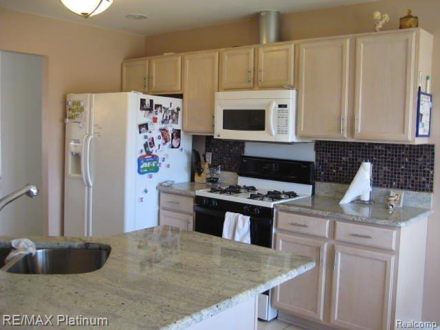 4348 Crandall Road Howell, MI 48855 - Photo 9 of 15 KITCHEN W/GRANITE