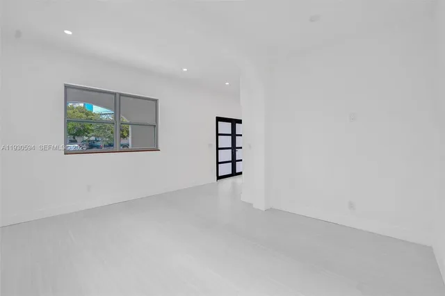 an empty room with windows