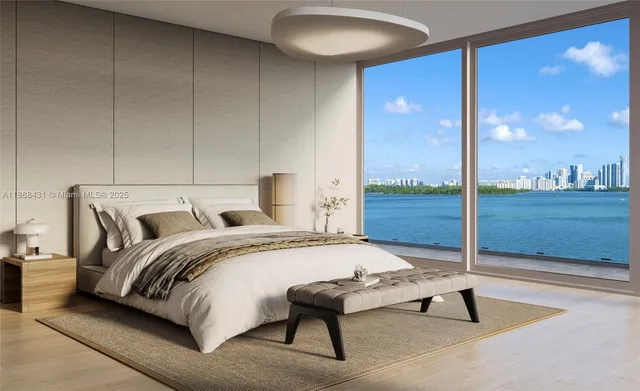 a bedroom with a bed lamp and window