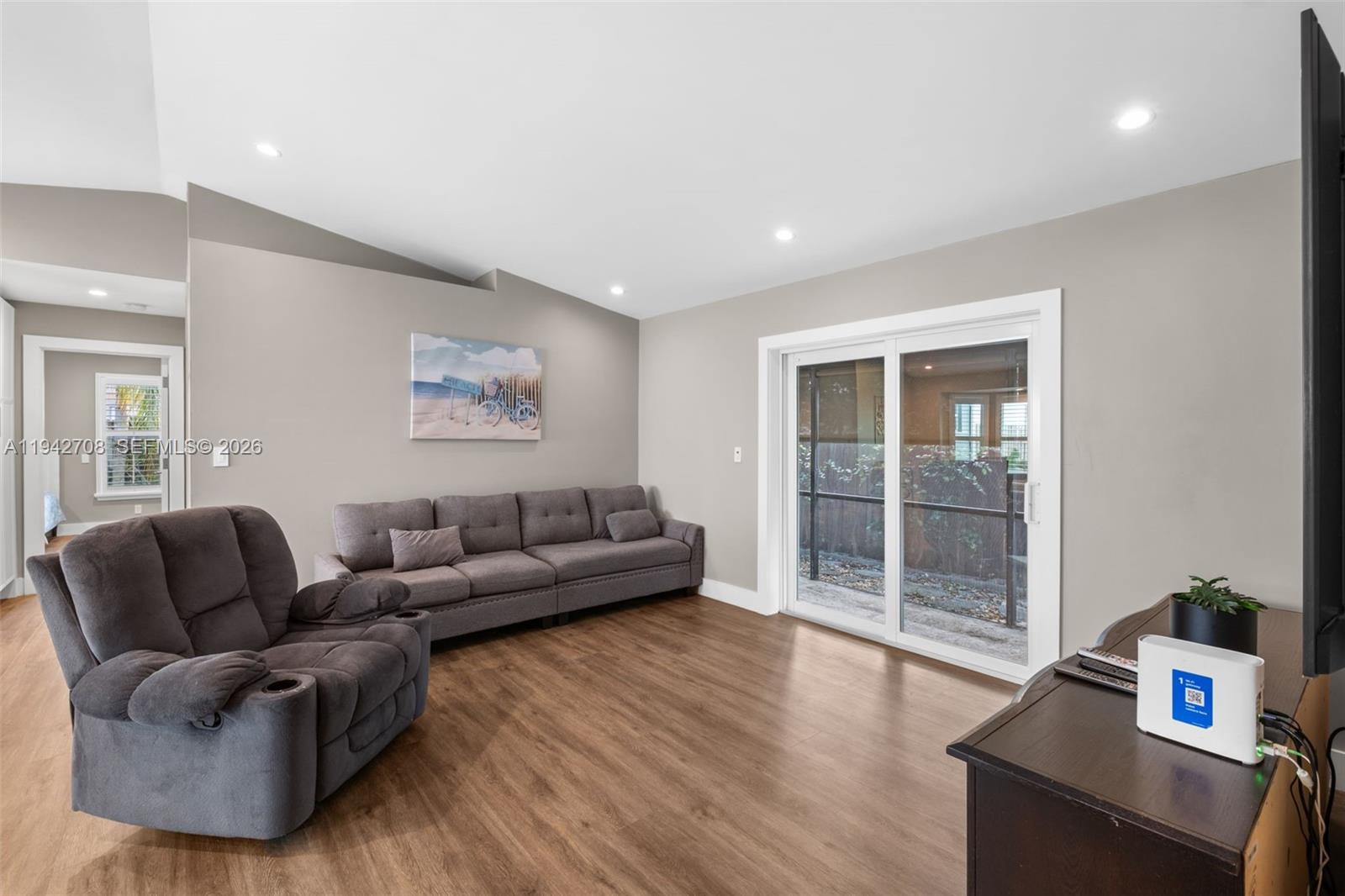 22239 Southwest 98th Place Cutler Bay, FL 33190 - Photo 13 of 67 a living room with furniture and a window